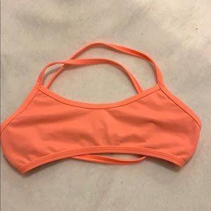 Jolyn Xavier top coral